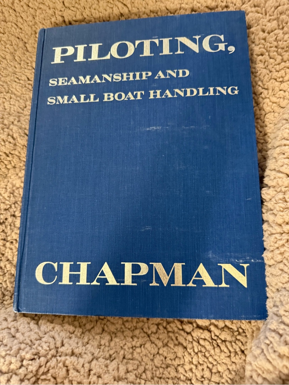 Piloting seamanship & small boat handling hardcover book writing on front page